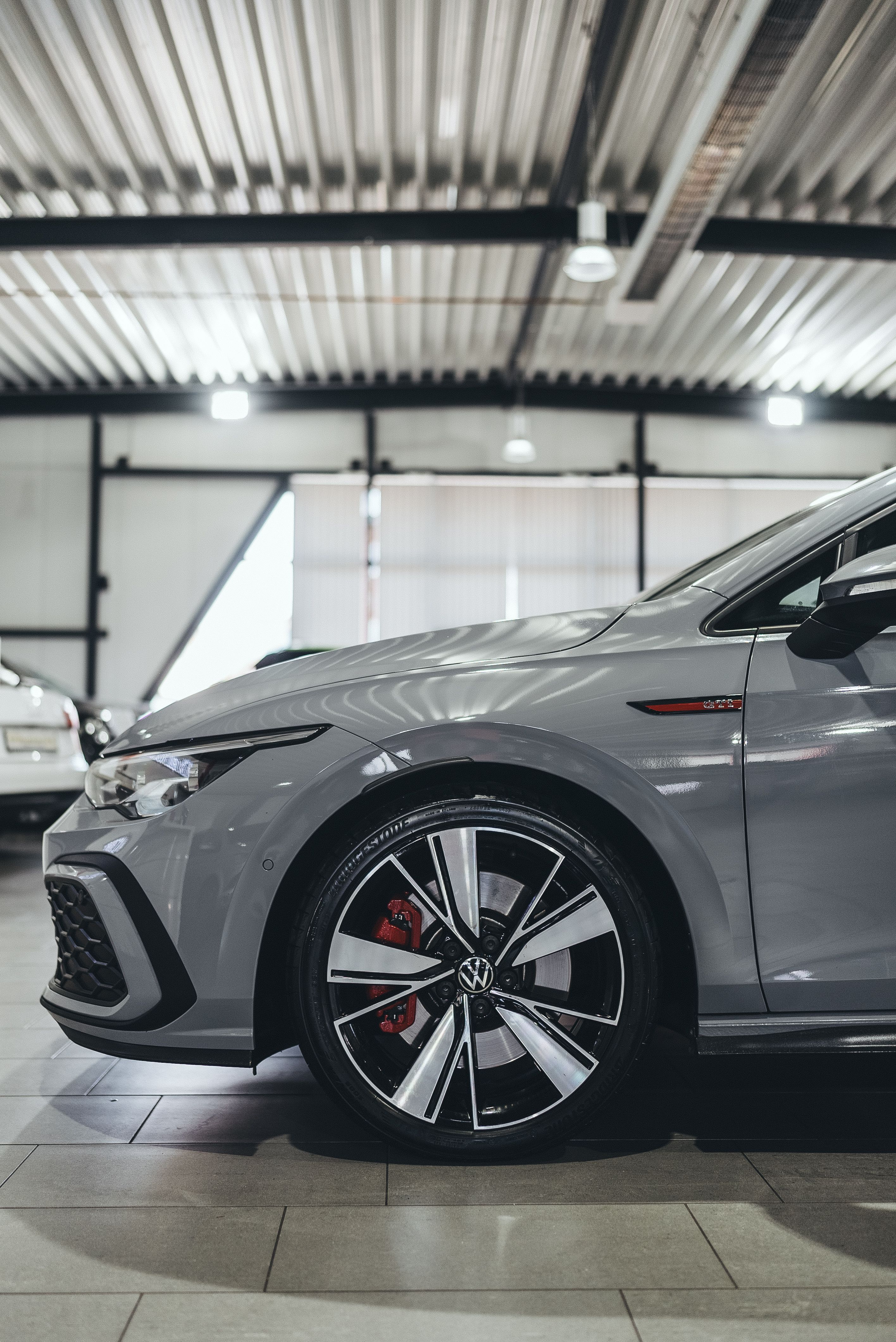 Pre-owned vehicle in a bright showroom